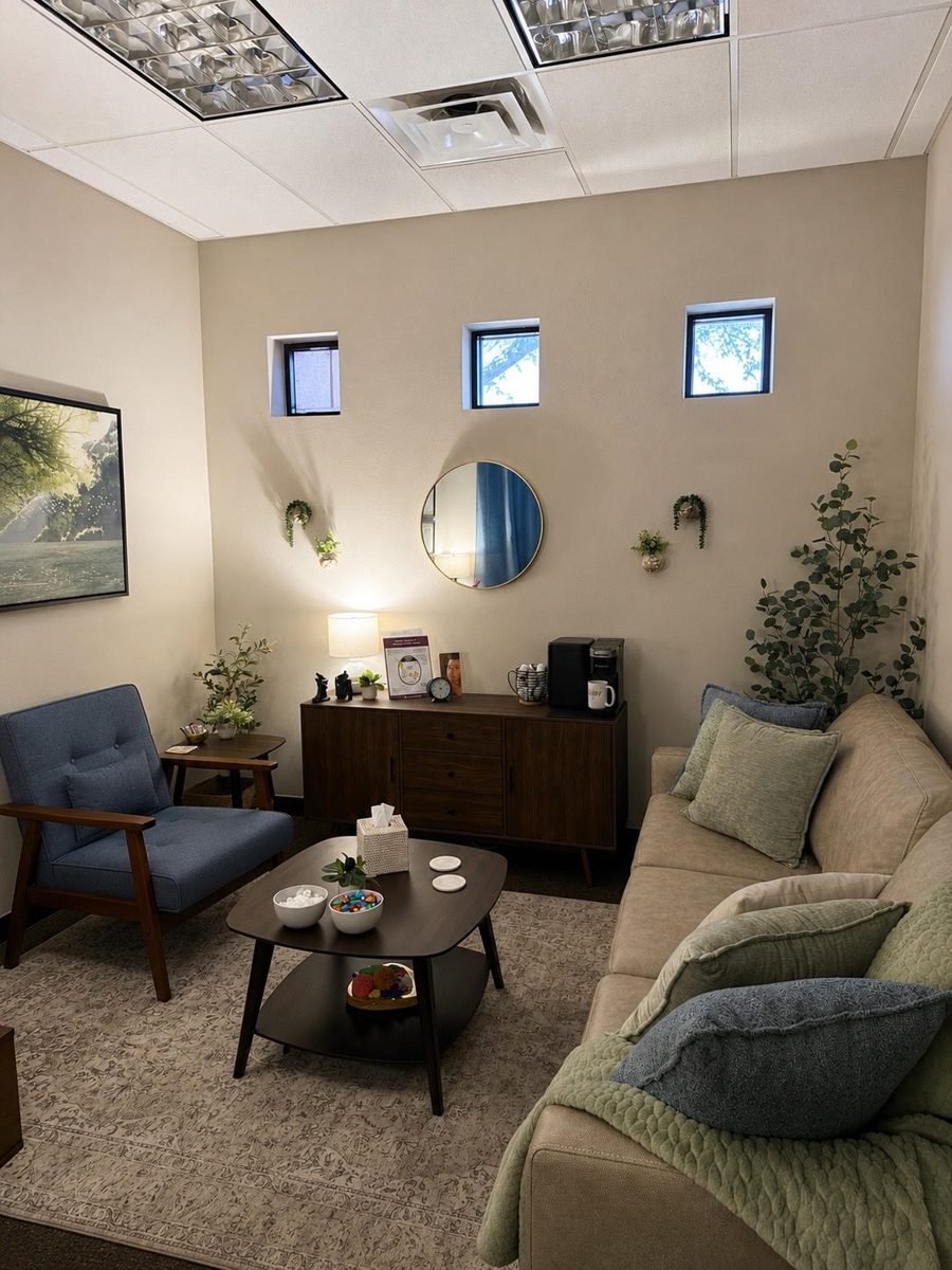 Therapy office seating area with natural light